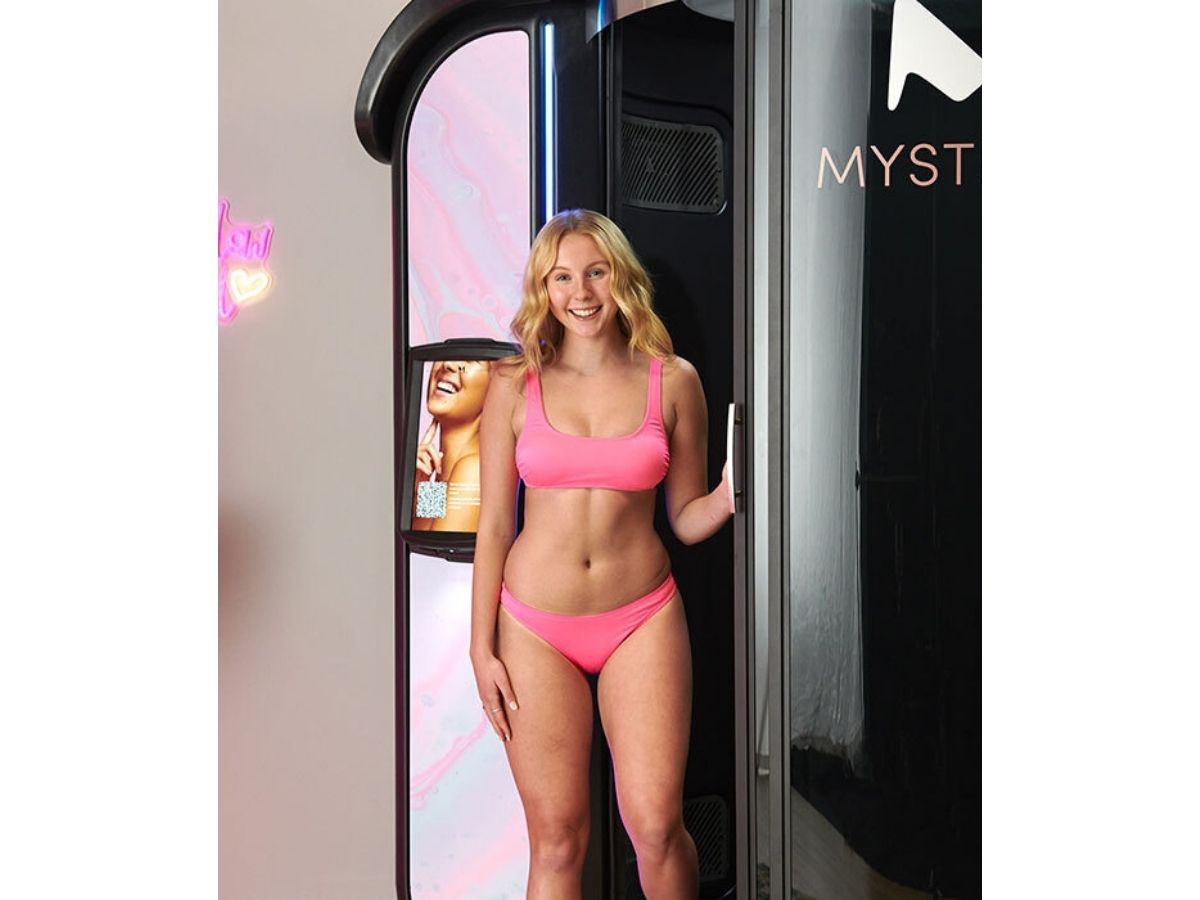 Mystic Unity automated spray booth at Planet Beach Spray and Spa Edmonton