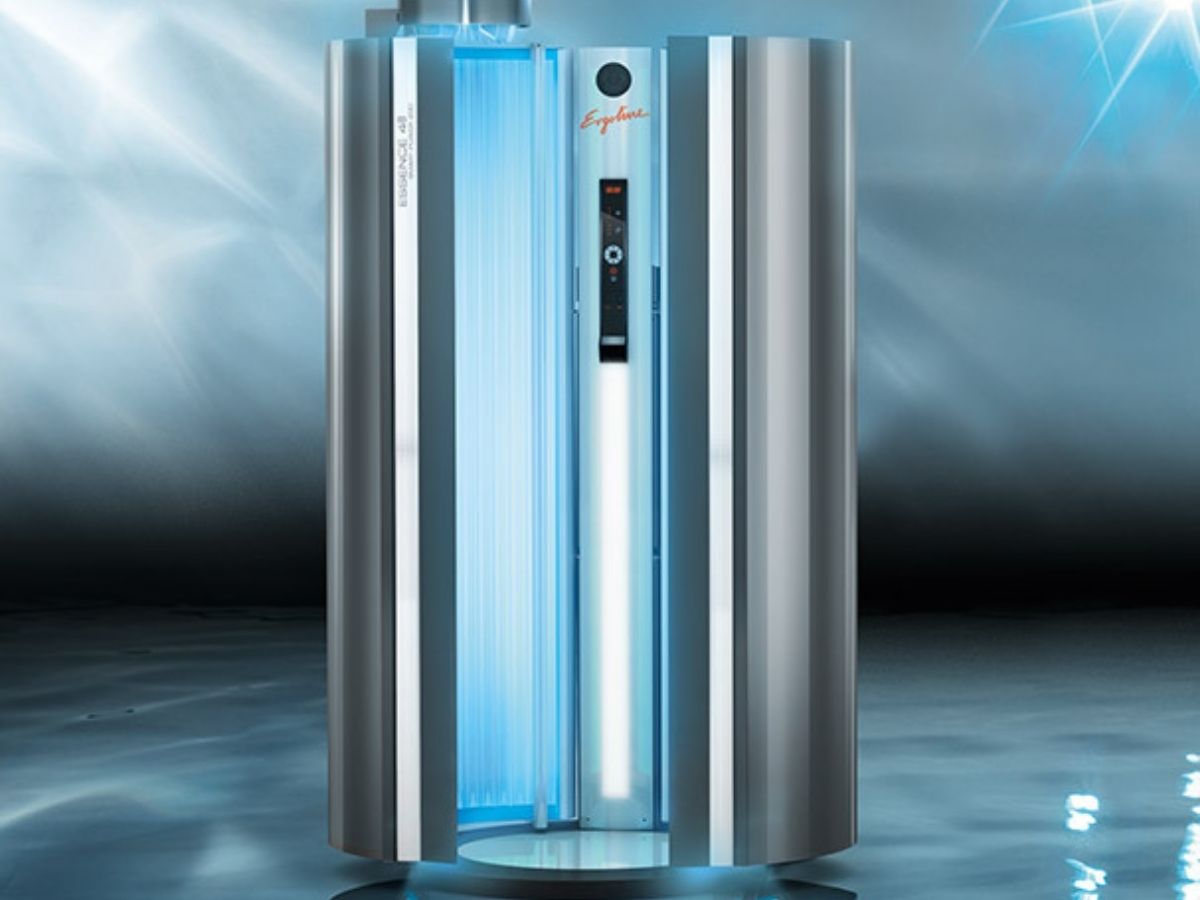 Essence stand-up UV Tanning bed at Planet Beach Spray and Spa with high-intensity 9-minute sessions